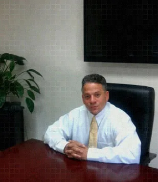 Attorney Yancy Garnett seated at his desk